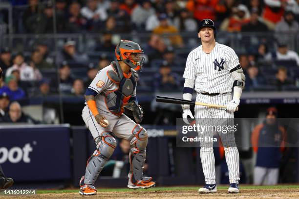 Josh Donaldson of the New York Yankees reacts after striking out in the eighth inning against the Houston Astros in game four of the American League...
