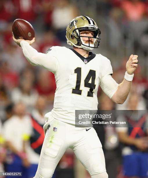Quarterback Andy Dalton of the New Orleans Saints throws a pass during the NFL game against the Arizona Cardinals at State Farm Stadium on October...