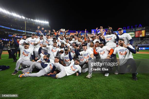 The Houston Astros pose for a team photo after defeating the New York Yankees in game four to win the American League Championship Series at Yankee...