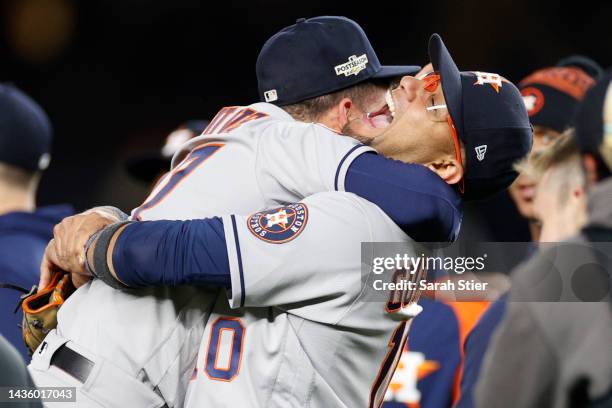 Jose Altuve and Yuli Gurriel of the Houston Astros celebrate after defeating the New York Yankees in game four to win the the American League...