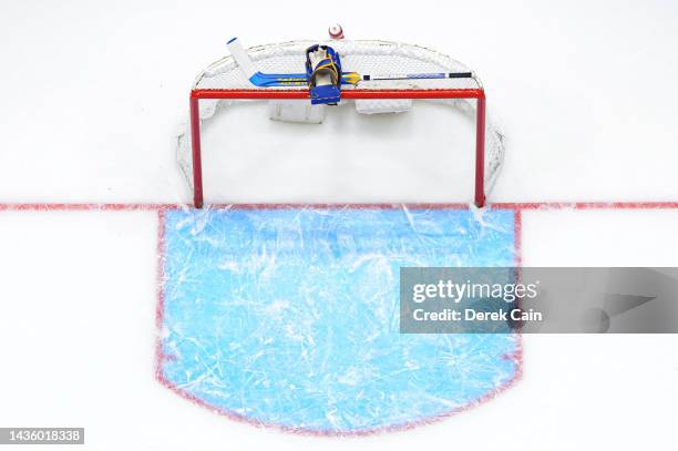 The blocker and stick of goalie Craig Anderson of the Buffalo Sabres sit on top of the net during the second period of their NHL game against the...
