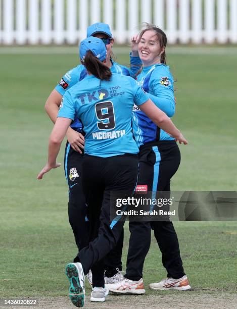 Amanda-Jade Wellington of the Adelaide Strikers celebrates the caught and bowled wicket of Hayley Matthews of the Melbourne Renegades for 8 runs with...