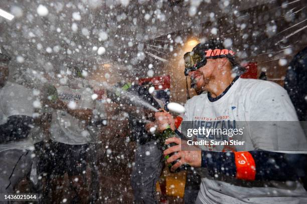 Christian Vazquez of the Houston Astros celebrates in the locker room after defeating the New York Yankees in game four of the American League...