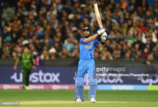Virat Kohli of India hits a six during the ICC Men's T20 World Cup match between India and Pakistan at Melbourne Cricket Ground on October 23, 2022...