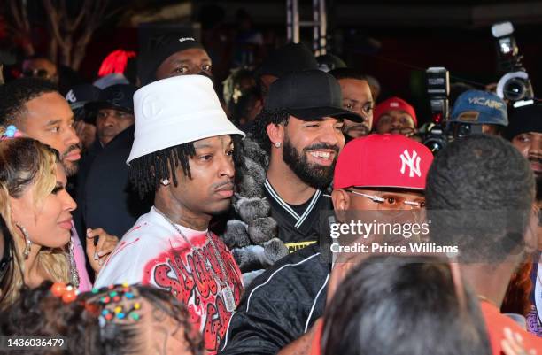 Savage and Drake attend 21 Savage's Freaknik22: The Sequel at Underground Atlanta on October 22, 2022 in Atlanta, Georgia.