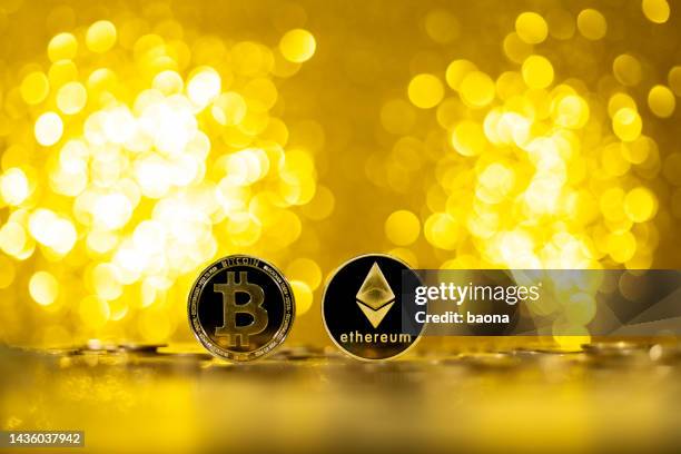 ethereum and bitcoin cryptocurrency on shiny background - ethereum stockfoto's en -beelden