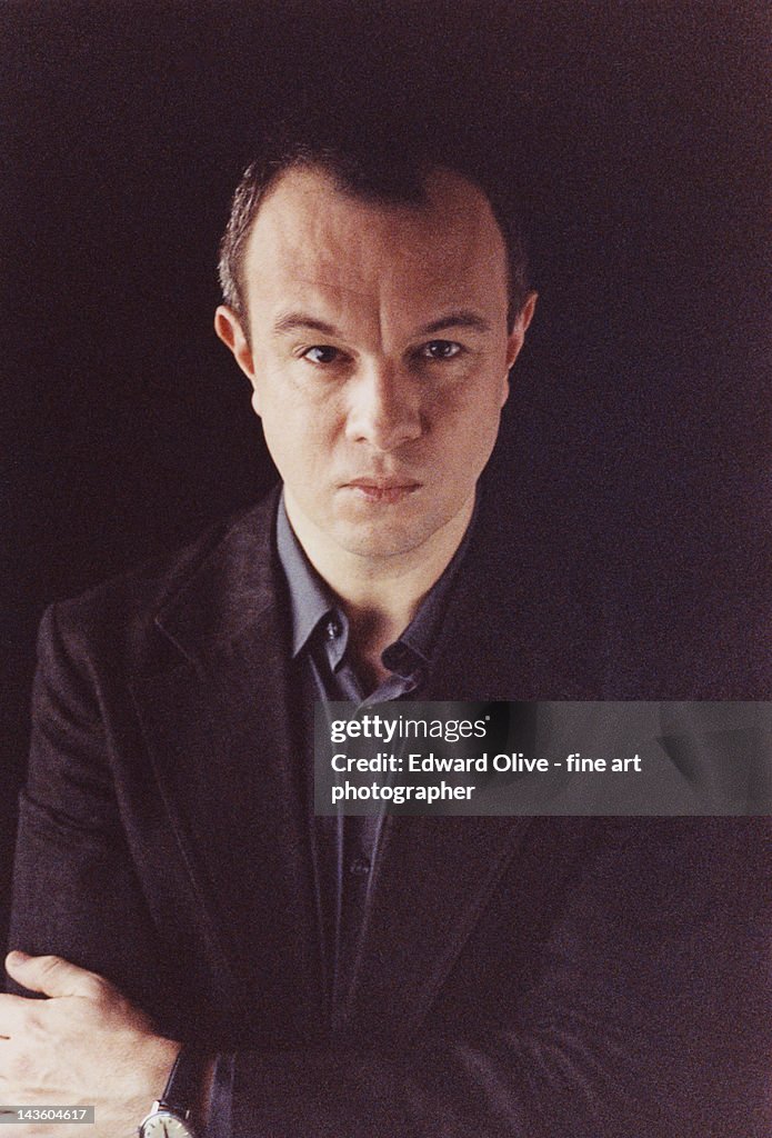 Color portrait of man wearing dark business suit
