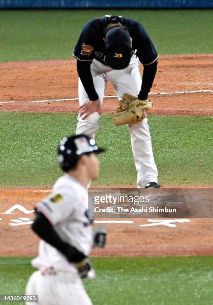 Shota Abe of the Orix Buffaloes reacts after allowing a three run home run to Soma Uchiyama of the Yakult Swallows in the 9th inning during the Japan...