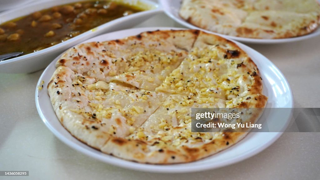 Traditional Indian Cuisine Garlic Naan, Food