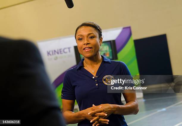 Dominique Dawes speaks during the Active Play Video Game Demonstration at Walker-Jones Education Campus on April 30, 2012 in Washington, DC.