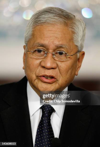 Philippine Foreign Affairs Secretary Albert Del Rosario answers reporters' questions during a news conference in the Treaty Room at the State...