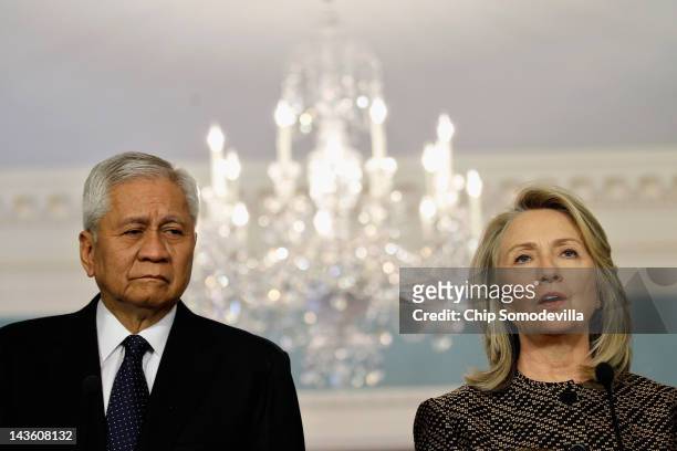 Philippine Foreign Affairs Secretary Albert Del Rosario and U.S. Secretary of State Hillary Clinton participate in a joint news conference in the...