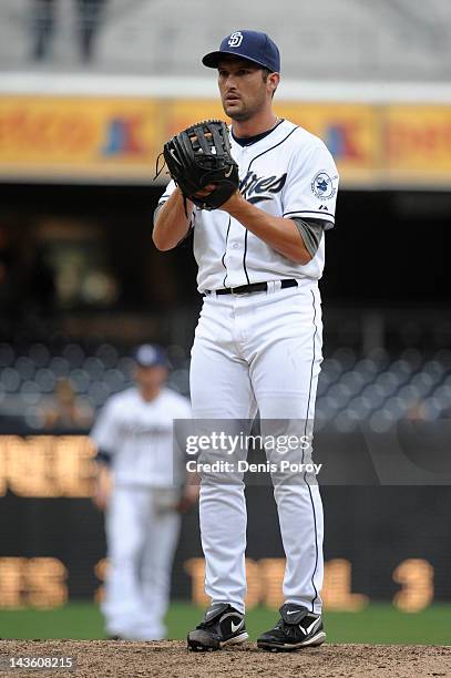 Huston Street of the San Diego Padres pitches during a baseball game against the San Diego Padres at Petco Park on April 25, 2012 in San Diego,...