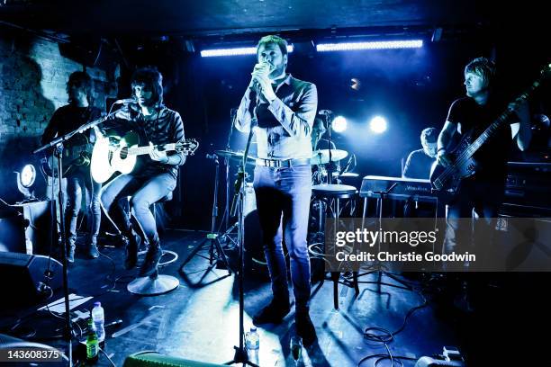 Jay Mehler, Sergio Pizzorno, Tom Meighan, Ian Matthews and Chris Edwards of Kasabian perform a secret gig for Absolute Radio at The Box Soho on April...