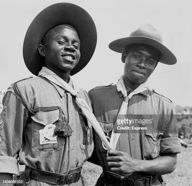 Two Ghanaia boy scouts in uniform attend the World Scout Jubilee Jamboree at Sutton Coldfield, West Midlands, England, 2nd August 1957. The jamboree...