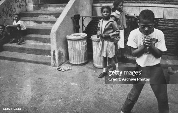 Child Stooping Black Child Photos and Premium High Res Pictures - Getty Images