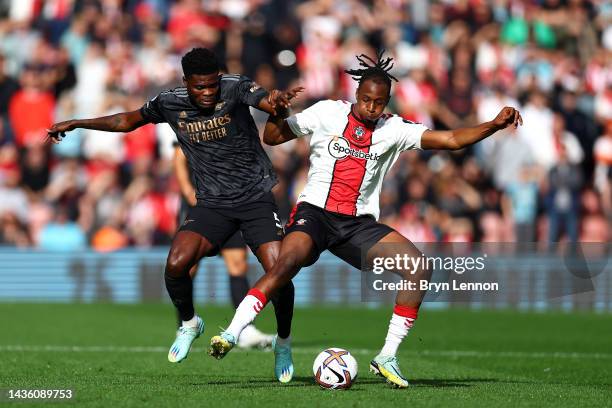 Thomas Partey of Arsenal battles for possession with Joe Aribo of Southampton during the Premier League match between Southampton FC and Arsenal FC...