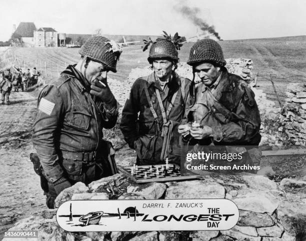 John Wayne and Stuart Whitman playing chess in the 1962 World War II movie, 'The Longest Day'. .