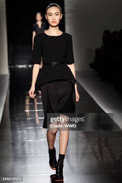 Model on the runway at Sportmax's fall 2011 show.