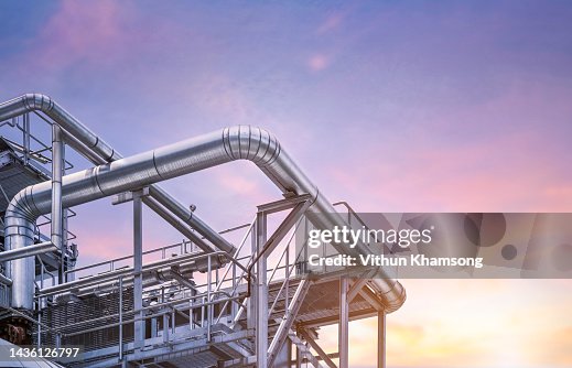 Steel pipelines and beautiful sky at industrial zone Steel pipelines and beautiful sky at industrial zone