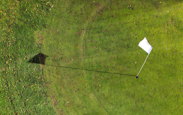 golf flag shadow - golf stock pictures, royalty-free photos & images