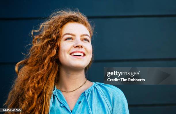 woman looking up smiling - kind people stock pictures, royalty-free photos & images