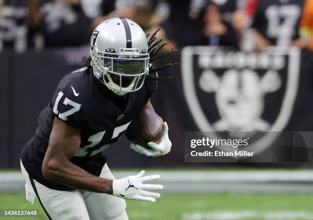 Wide receiver Davante Adams of the Las Vegas Raiders runs after a catch against the Houston Texans in the first half of their game at Allegiant...