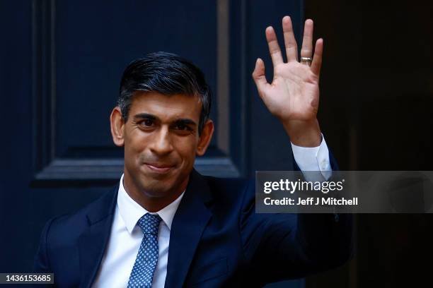 New Conservative Party leader and incoming prime minister Rishi Sunak waves as he departs Conservative Party Headquarters on October 24,2022 in...