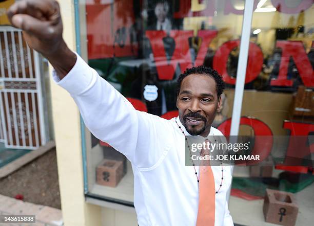 Rodney King gestures prior to the presentation of his autobiographical book 'The Riot Within...My Journey from Rebellion to Redemption' at the Eso...