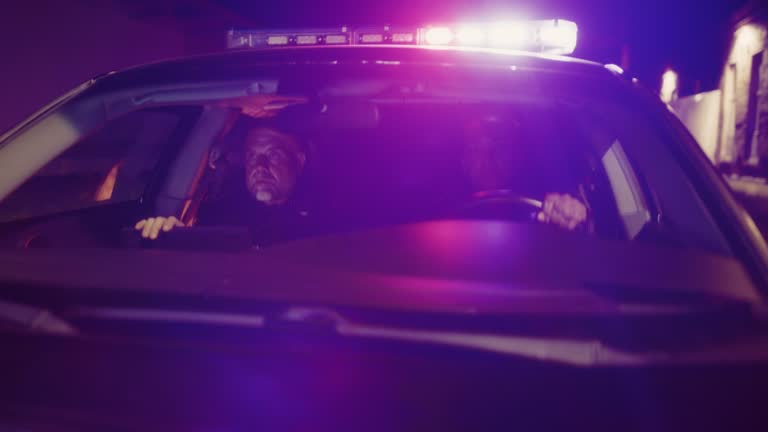 Dispatch Cars Police Point of View: Two Police Officers on Duty Driving Traffic Patrol Car ...