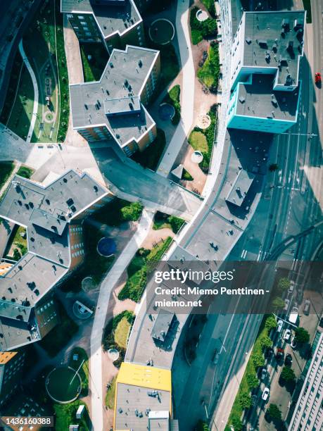 top-down aerial view into modern residential buildlings in konepaja district in downtown helsinki - helsinki stock pictures, royalty-free photos & images