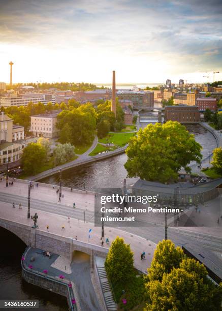 aerial view of the tammerkoski rapids in the center of tampere, finland on a summer evening - tampere foto e immagini stock