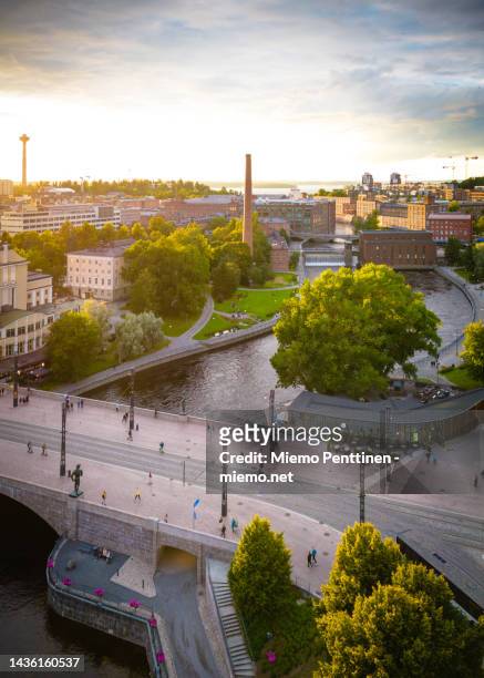 aerial view of the tammerkoski rapids in the center of tampere, finland on a summer evening - tampere finland stockfoto's en -beelden