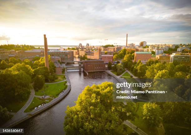 aerial view of the tammerkoski rapids in the center of tampere, finland on a summer evening - tampere foto e immagini stock