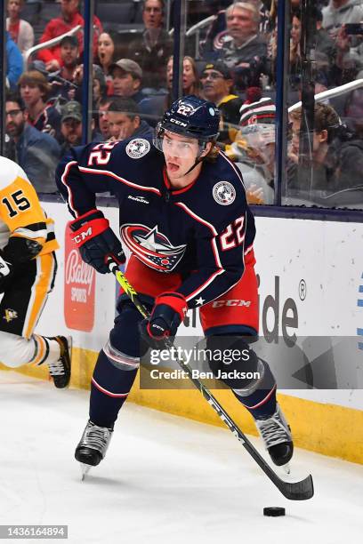 Jake Bean of the Columbus Blue Jackets skates with the puck during the first period of a game against the Pittsburgh Penguins at Nationwide Arena on...