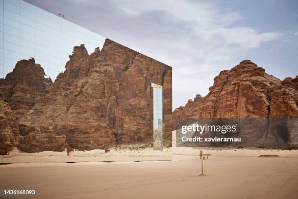 sandstone outcrops reflecting in maraya concert hall facade - arabian peninsula stock pictures, royalty-free photos & images