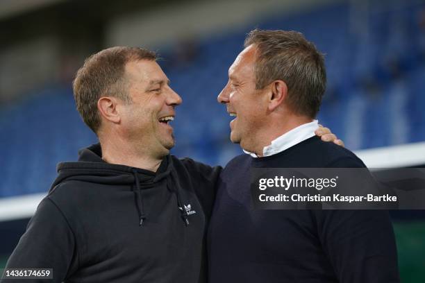 Frank Kramer, Head coach of FC Schalke 04 interacts with Andre Breitenreiter, Head coach of TSG 1899 Hoffenheim prior to the DFB Cup second round...