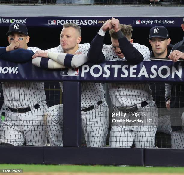 New York Yankees players Jose Trevino, Josh Donaldson and Harrison Bader on the dugout steps in the 9th inning in game 4 of the ALCS against the...