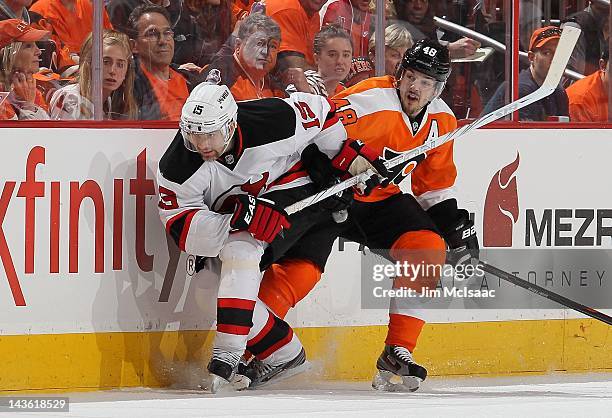 Petr Sykora of the New Jersey Devils in action against Danny Briere of the Philadelphia Flyers in Game One of the Eastern Conference Semifinals...