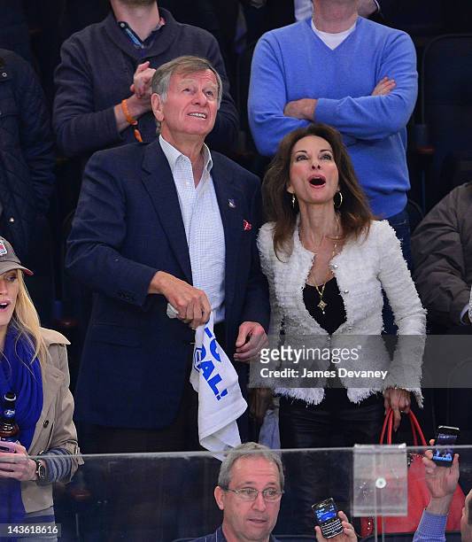 Helmut Huber and Susan Lucci attend the Washington Capitals vs New York Rangers playoff game at Madison Square Garden on April 30, 2012 in New York...