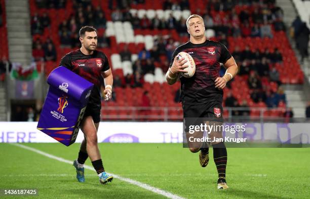 Players of Wales warm up ahead of the Rugby League World Cup 2021 Pool D match between Tonga and Wales at Totally Wicked Stadium on October 24, 2022...