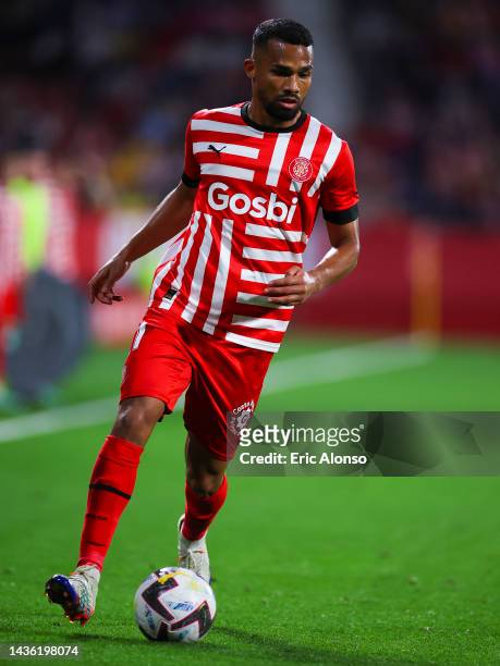 Yangel Herrera of Girona FC runs with the ball during the LaLiga Santander match between Girona FC and CA Osasuna at Montilivi Stadium on October 23,...
