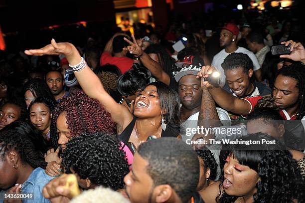 Hundreds of young adults crowd the nightclub The Scene as they dance to the Go Go band TCB's music in Northeast Washington, D.C. On April 13, 2012...