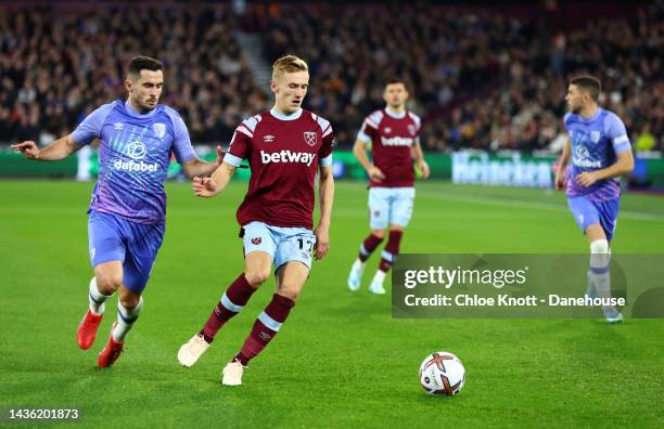 Flynn Downes of West Ham United and Lewis Cook of AFC Bournemouth in action during the Premier League match between West Ham United and AFC...