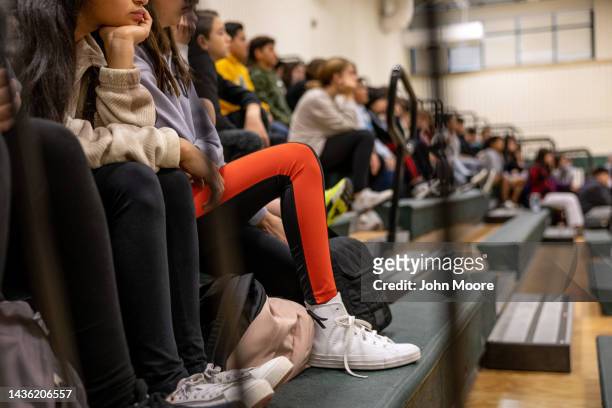 Eighth grade students listen to a police lecture on internet safety and cyberbullying at the Scofield Magnet Middle School on October 24, 2022 in...