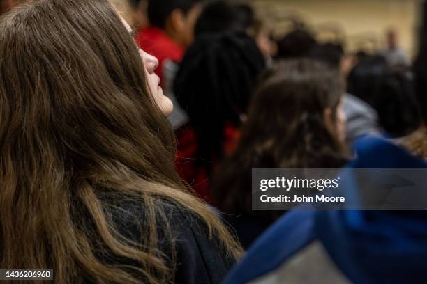 Eighth grade students listen to a police lecture on internet safety and cyberbullying at the Scofield Magnet Middle School on October 24, 2022 in...