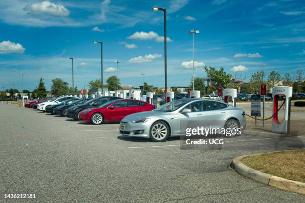 Electric cars at charging stations at Springfield Mall, Springfield, Virginia.