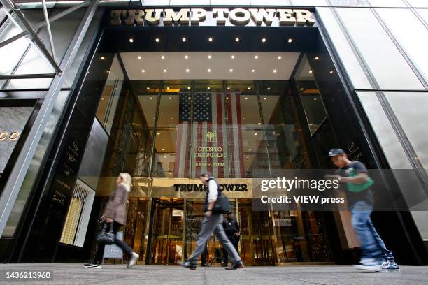 People make their way past the Trump Tower on October 24, 2022 in New York City. The Trump Organization trial begins in Manhattan following years of...