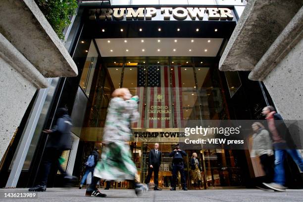 People make their way past the Trump Tower on October 24, 2022 in New York City. The Trump Organization trial begins in Manhattan following years of...