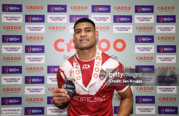 Daniel Tupou of Tonga poses after being named Player of the Match following the Rugby League World Cup 2021 Pool D match between Tonga and Wales at...
